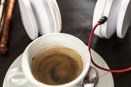 A white cup filled with delicious coffee