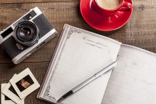 Old Slides  with black camera and coffee