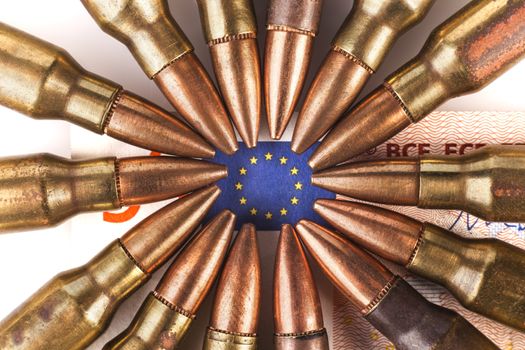 Euro Bancknote with european union flag surrounded by bullets