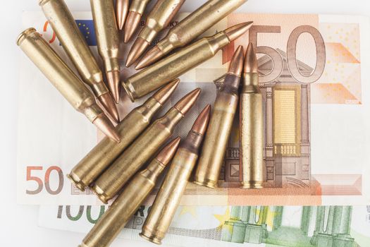 Euro Bancknotes with Rifle  Bullets