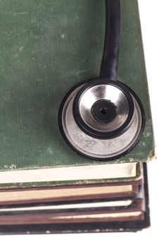 Old Books Black Stethoscope Isolated on White Background