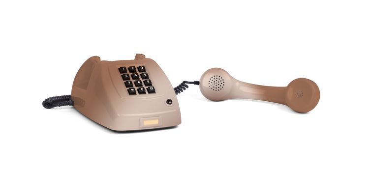Vintage brown telephone with a white background