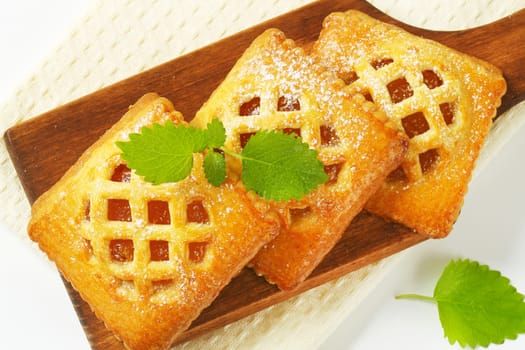 Little lattice-topped pies with apricot filling