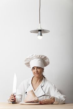 female chef with a knife