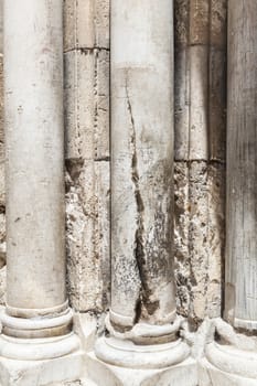 Cracked pillar at the entrance of the holy sepulchre church in jerusalem
