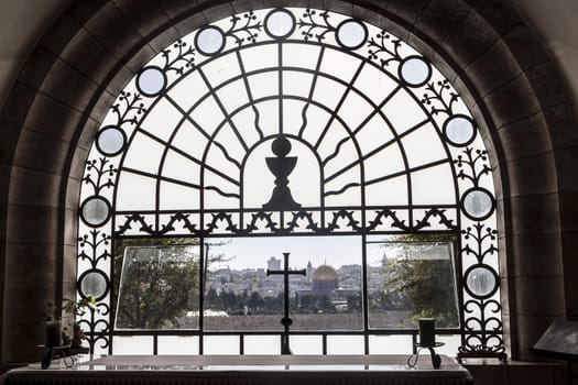 Beautiful view of Jerusalem city through a church window