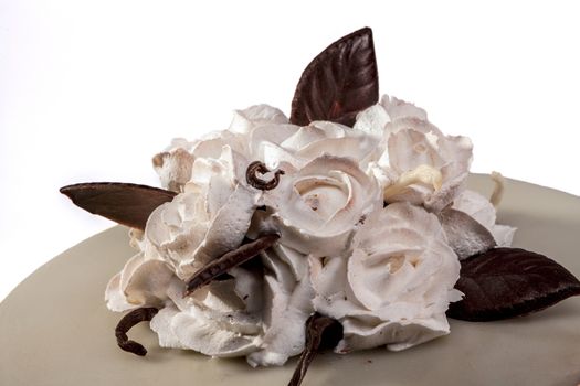 Roses on cake isolated on white background