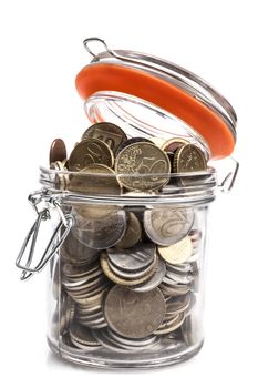 Jar with coins isolated on white background