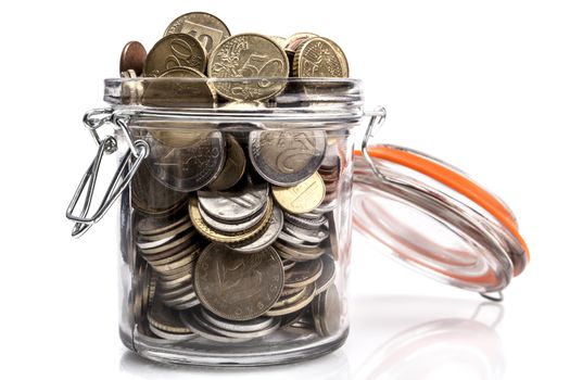 Jar with money isolated on white background with reflection and shadow