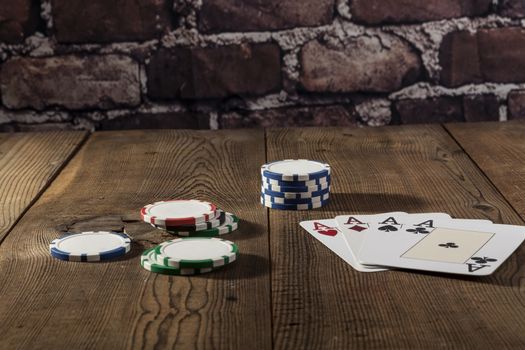 Chips and Cards on brown wood table