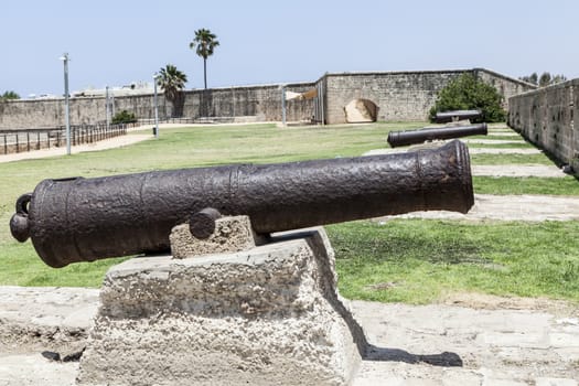 Field with cannons and walls and beautiful blue sky