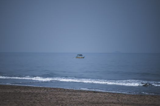 Panorama landscape view of a beautiful tropical sea beach in summertime during christmas holiday. ( MUMBAI, MAHARASTRA, INDIA). Travel vacation and holiday concept.