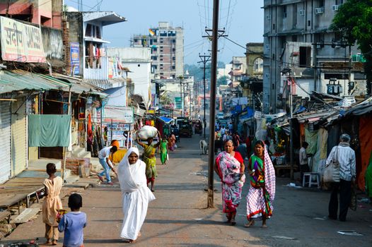 PARESHNATH, JHARKHAND, INDIA - JAN 25: People and crowds walking through the famous weekend market area. It was believed to be a popular Maoist area earlier.