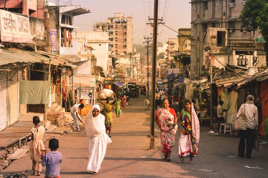 PARESHNATH, JHARKHAND, INDIA - JAN 25: People and crowds walking through the famous weekend market area. It was believed to be a popular Maoist area earlier.