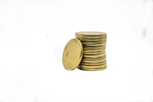 Stack of Indian rupee coins isolated on white background