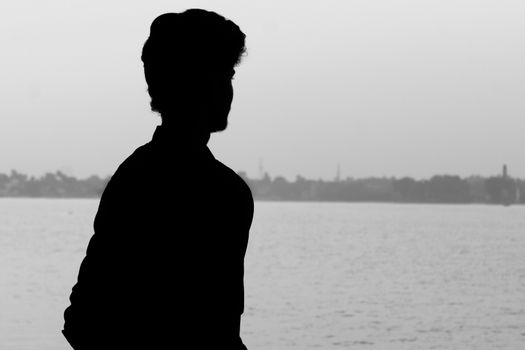 Silhouette man portrait in isolated background