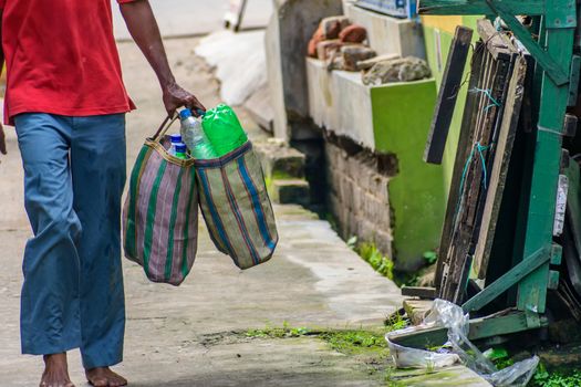 Plastic bottle are carrying out for recycling. Stop using plastic. Beat plastic pollution . Save the earth and environment concept. World Environment Day 2018. Kolkata, West Bengal, India, Asia