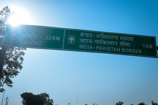 India Pakistan border road signboard. Amritsar Lahore. Asia