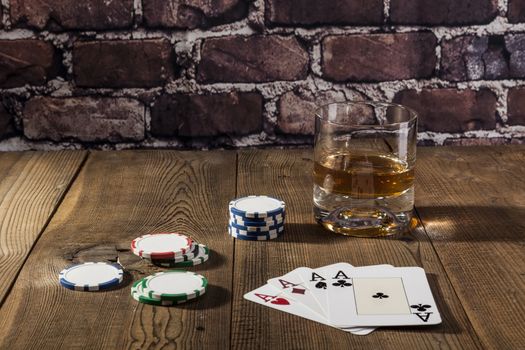 Cards and chips on brown wood table