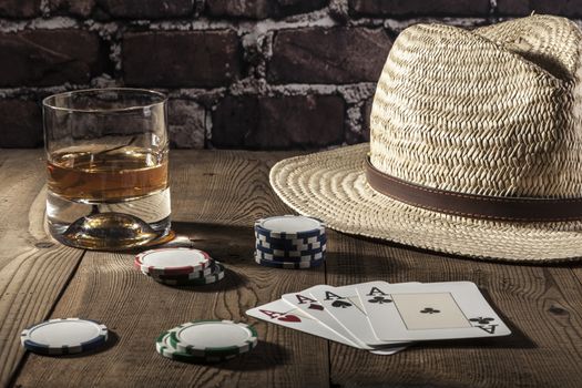 Cards and chips on brown wood table