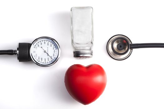 Medical Instrument Isolated on White Background with Red Heart