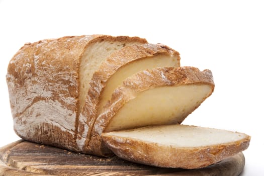 Home made Bread Sliced on wood and white background