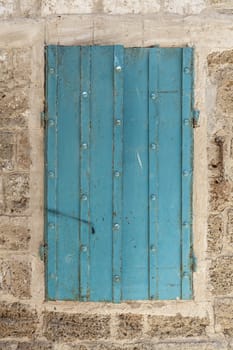 Old Blue door or window on the wall