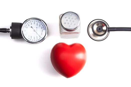 Medical Instrument Isolated on White Background with Salt and Red Heart