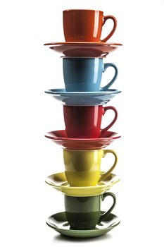 Colorful cups isolated on white background with shadow