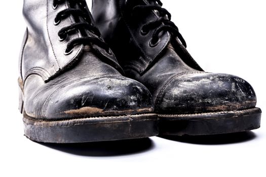 Army boots isolated on white background with shadow