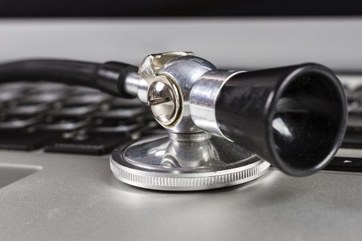 Black Stethoscope Closeup Isolated on White Background