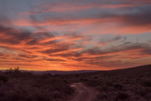 A fiery sunset at Perdekloof in the Tankwa Karoo of South Africa