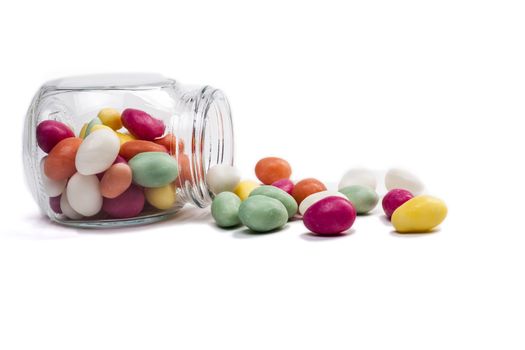 Spilled From Jar Color Candy Isolated On White Background
