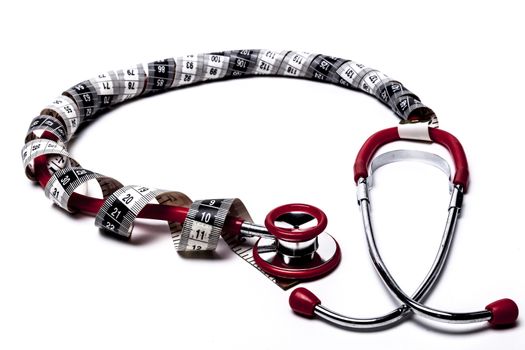 Red Stethoscope With Black Measuring Tape Isolated on White
