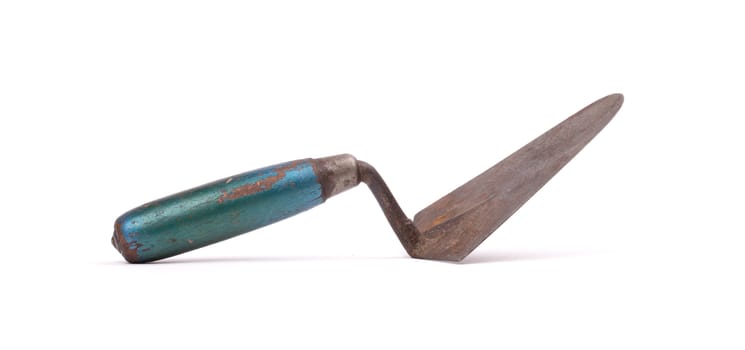 Old and rusty trowel, isolated on white