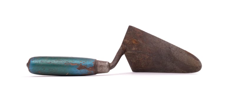 Old and rusty trowel, isolated on white