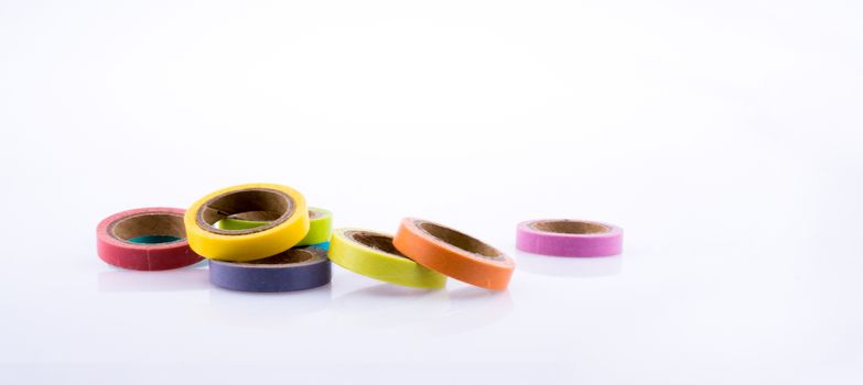 colorful insulating adhesive tapes on white background