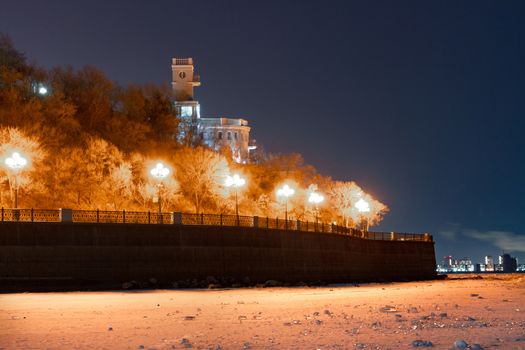 Evening view of the city of Khabarovsk in the winter. The ice on the Amur river.