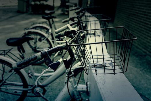 Stops in the city Bicycles, detail of a means of transportation on the street, health and environment