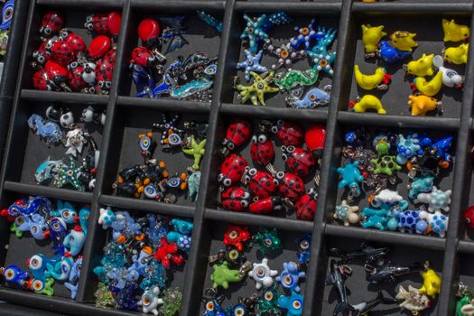 Colorful beads of various color at a market