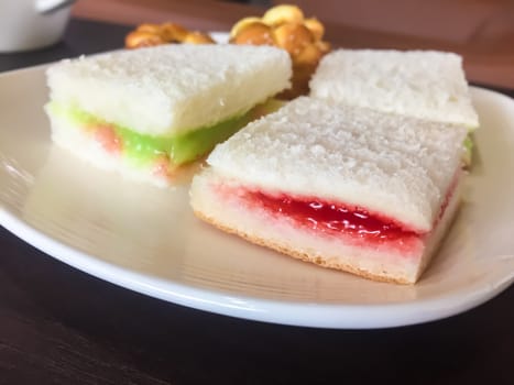 Slice of bread on a wooden table.