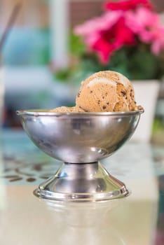 Chocolate chip ice cream on the table.