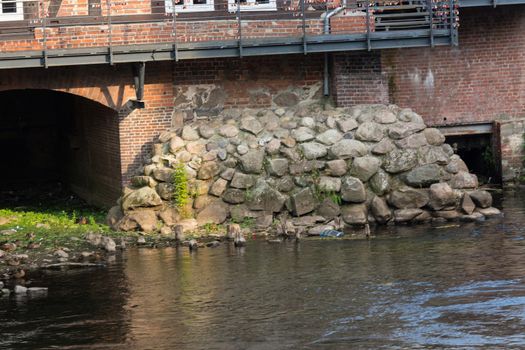 Embankment wall with big stone blocks. For protection against storm surges as well as floods. Used on coasts and rivers for protection