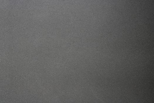 Texture of rough hard black steel panel, abstract background