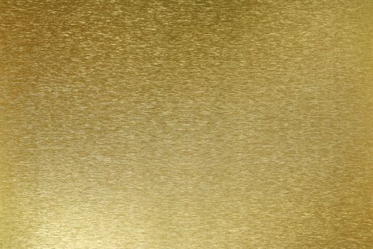 Texture of shiny old golden plate, abstract background, selective focus