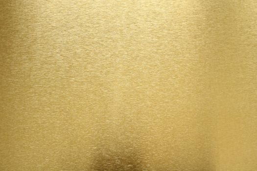 Texture of shiny old gold bar, abstract background, selective focus