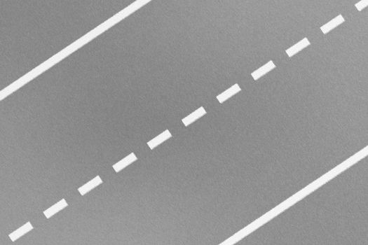 Top view of traffic white line marking on metal platform, abstract background