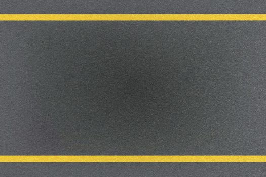 Top view of traffic yellow line marking on metal platform, abstract background