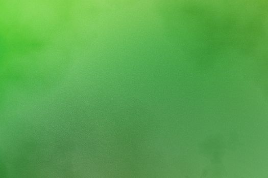 Texture of dirt on green cardboard, abstract background