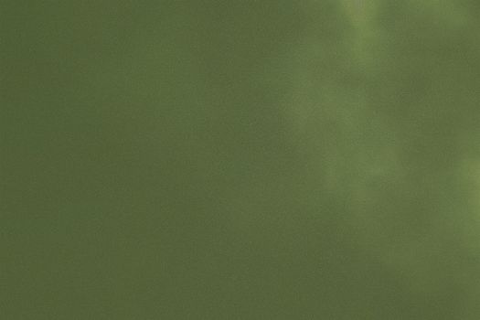 Texture of dirt on old dark green canvas, abstract background
